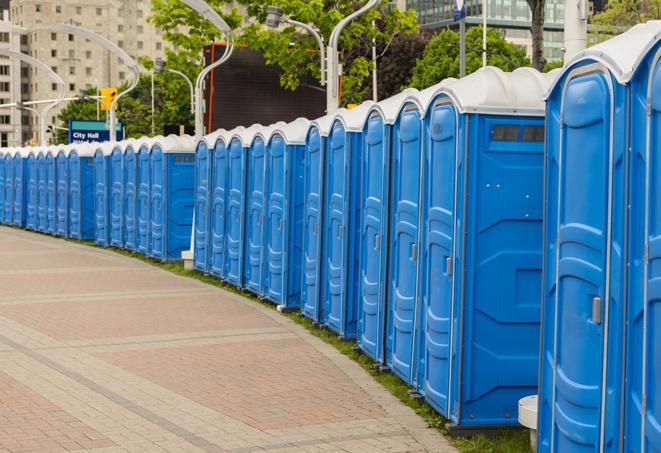 a row of portable restrooms at a trade show, catering to visitors with a professional and comfortable experience in Foster, RI